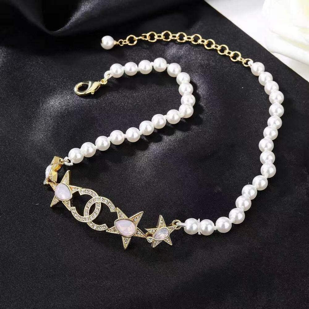 Chanel Gold Tone Pearl Choker Necklace Crystal Star & Interlocking CC Logo